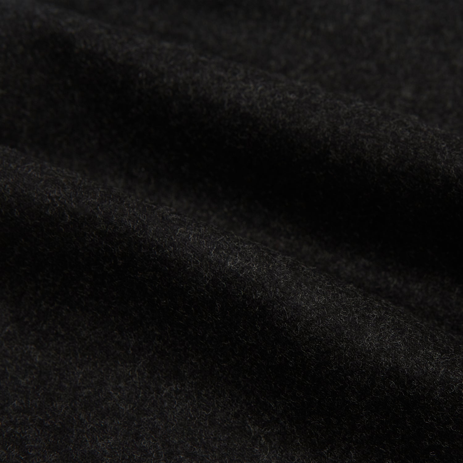 View 6 of product Turnbull & Asser’s Charcoal Henry Trousers, crafted from a wool-cashmere blend with button and zip closure, belt loops, and side pockets, are shown laid flat on a white background.