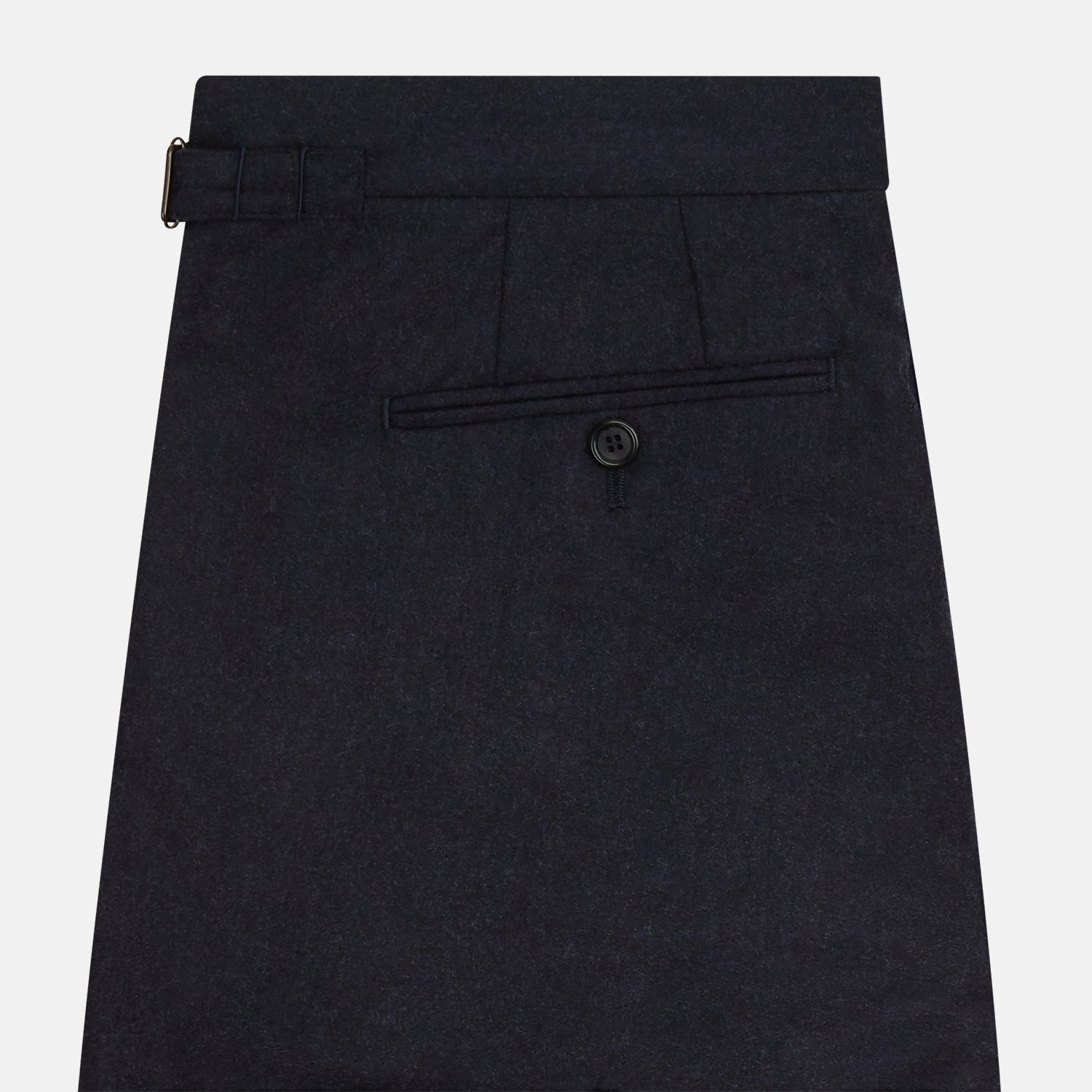 View 3 of product The Turnbull & Asser Navy Henry Trousers are tailored from a luxurious wool-cashmere blend, featuring front pleats, straight legs, and a button closure. Shown here laid flat on a white background.