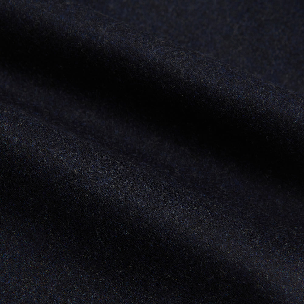 The Turnbull & Asser Navy Henry Trousers are tailored from a luxurious wool-cashmere blend, featuring front pleats, straight legs, and a button closure. Shown here laid flat on a white background.