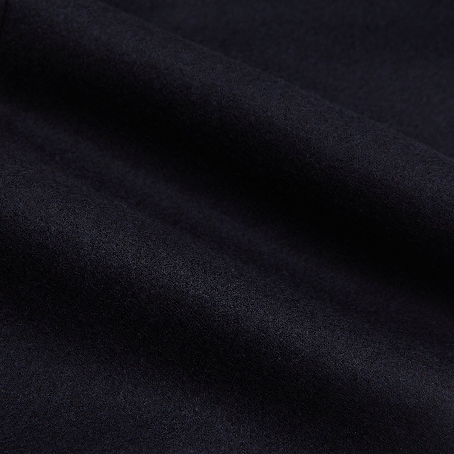 View 6 of product The Turnbull & Asser Midnight Blue Henry Trousers feature a tailored fit, button closure, belt loops, and front pleats in a luxurious wool-cashmere blend, shown against a plain white background.