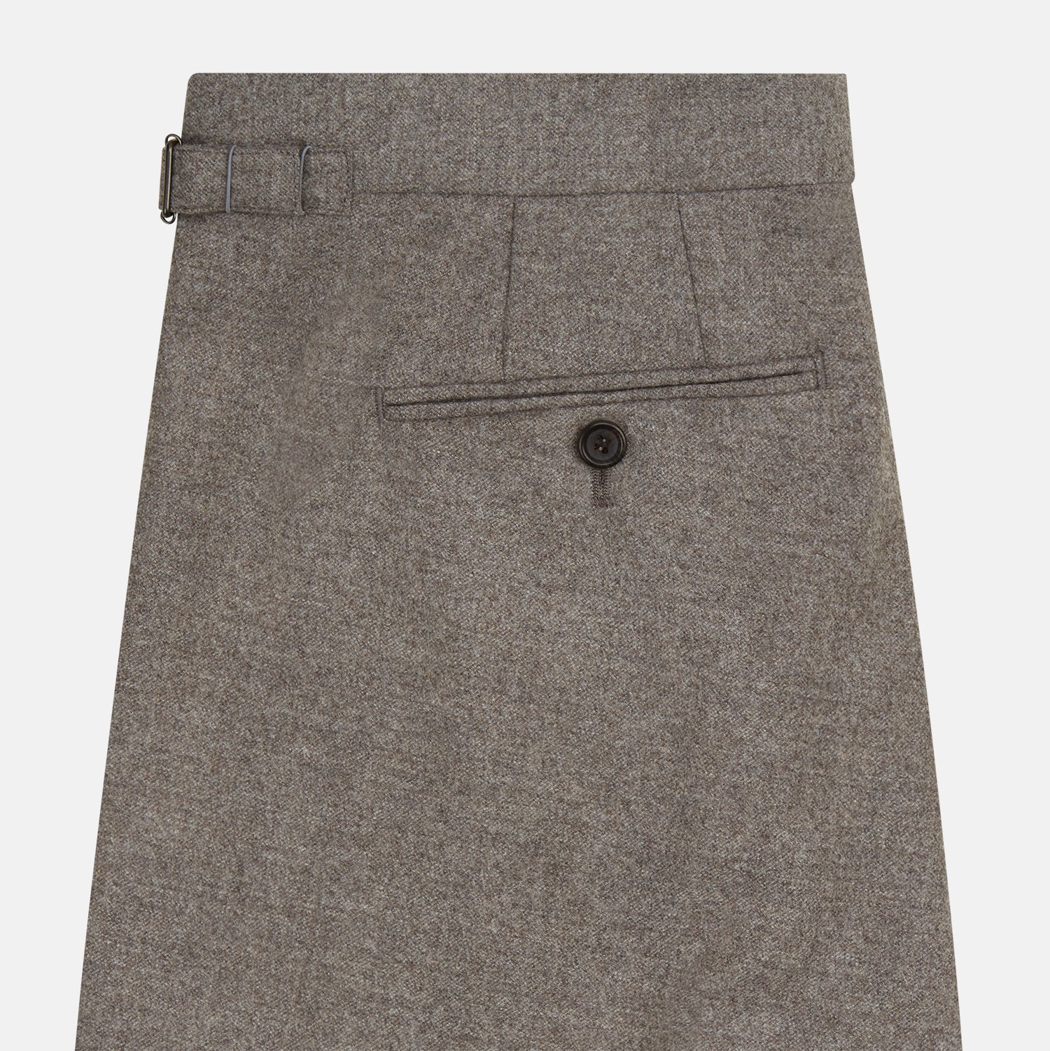 View 3 of product The Stone Henry Trousers by Turnbull & Asser, in a wool-cashmere blend, feature pleats, a button closure, belt loops, and straight legs, shown laid flat on a white background.