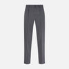 View 1 of product The Turnbull & Asser Charcoal Rupert Trousers, crafted from wool and cashmere with belt loops, button closure, and a slim tailored fit, are shown against a plain white background.