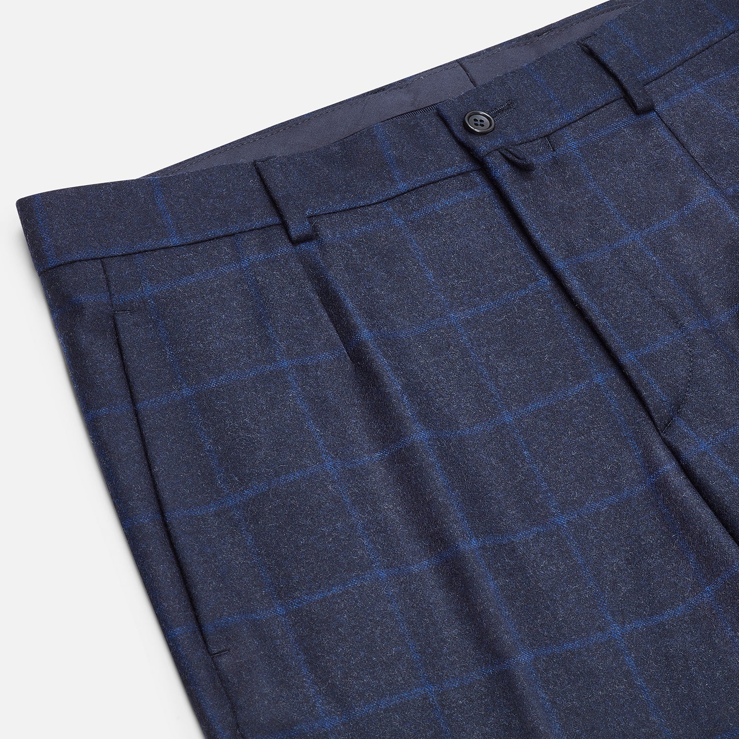 View 2 of product Turnbull & Asser Blue Checked Navy Rupert Trousers, crafted from a premium wool-cashmere blend, feature a subtle Prince of Wales check, belt loops, button closure, and straight legs. Shown on a plain white background.