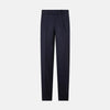 View 1 of product Turnbull & Asser UK Edward Navy Pleated Trousers in Wool Gabardine featuring a navy blue, tailored silhouette with a straight-leg cut and pleated detailing.