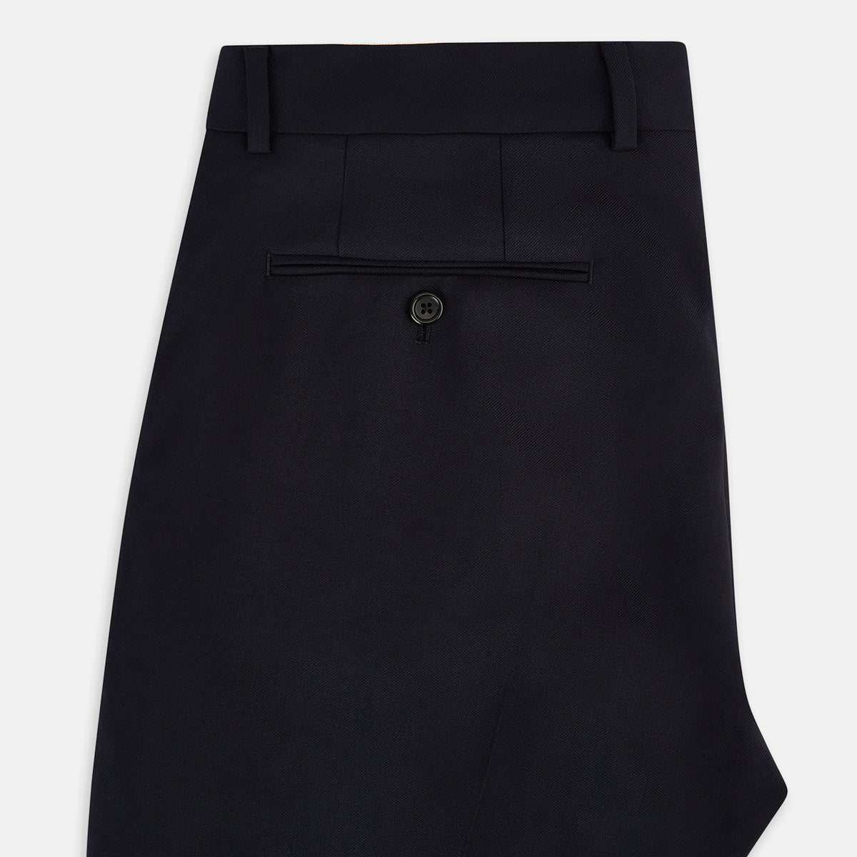 View 5 of product Turnbull & Asser UK Edward Navy Pleated Trousers in Wool Gabardine featuring a navy blue, tailored silhouette with a straight-leg cut and pleated detailing.