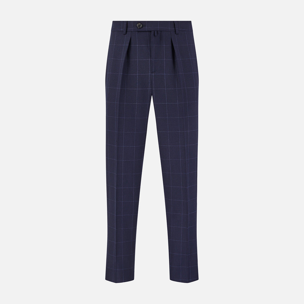 Turnbull & Asser Navy Check Edward Trousers feature a subtle white windowpane pattern, pleated front, belt loops, and button closure, shown against a plain white background.