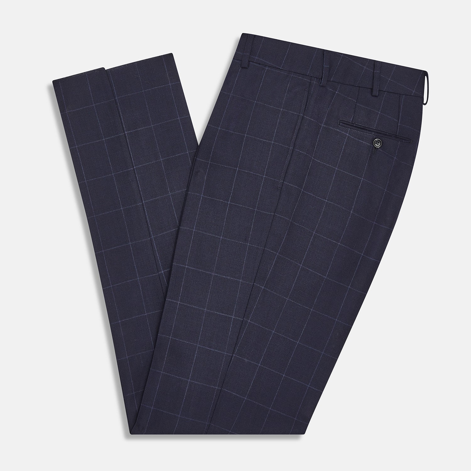 View 5 of product Turnbull & Asser Navy Check Edward Trousers feature a subtle white windowpane pattern, pleated front, belt loops, and button closure, shown against a plain white background.