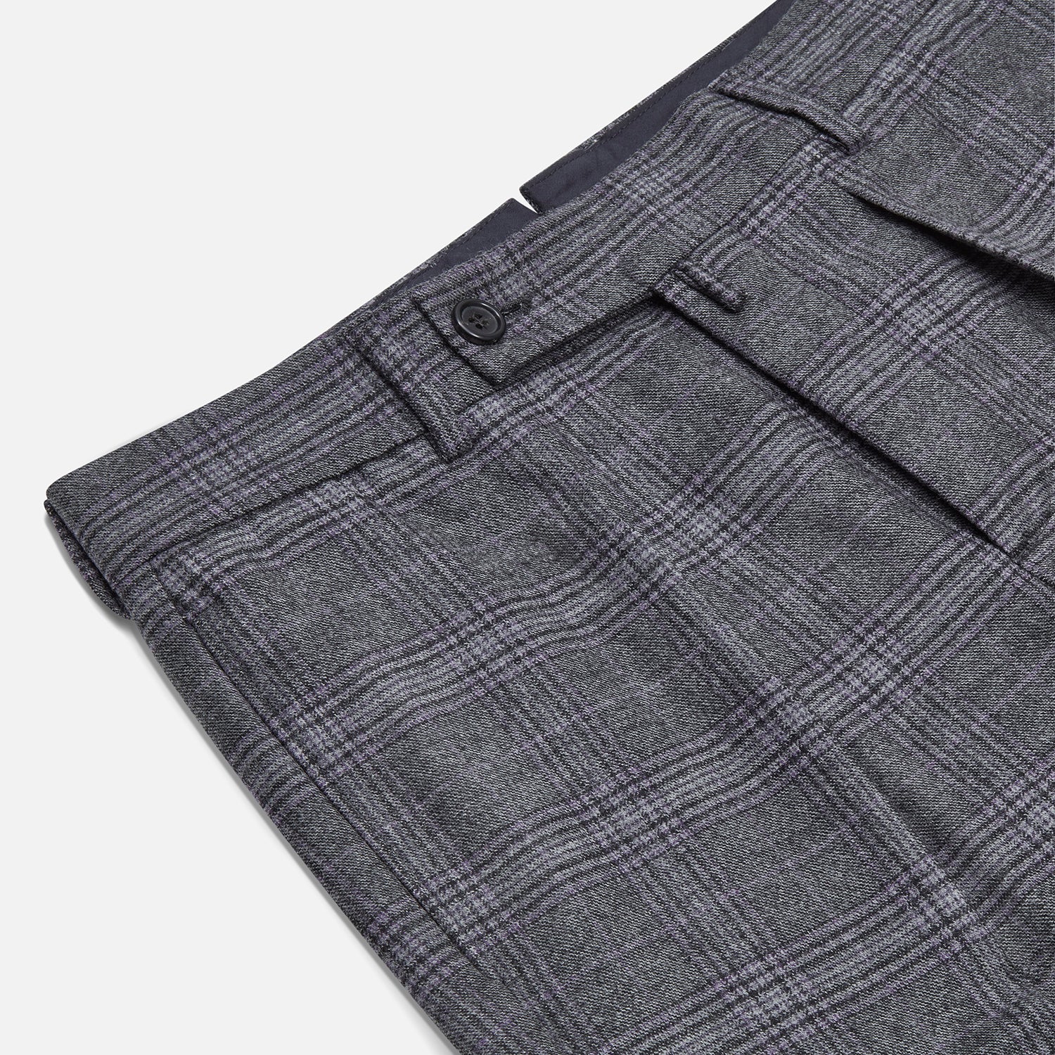 View 2 of product Turnbull & Asser's Grey Check Edward Trousers feature a tailored fit, front pleats, waistband with belt loops, and button closure—crafted from a wool-cotton blend. Ideal for semi-formal wear. Shown on a plain white background.
