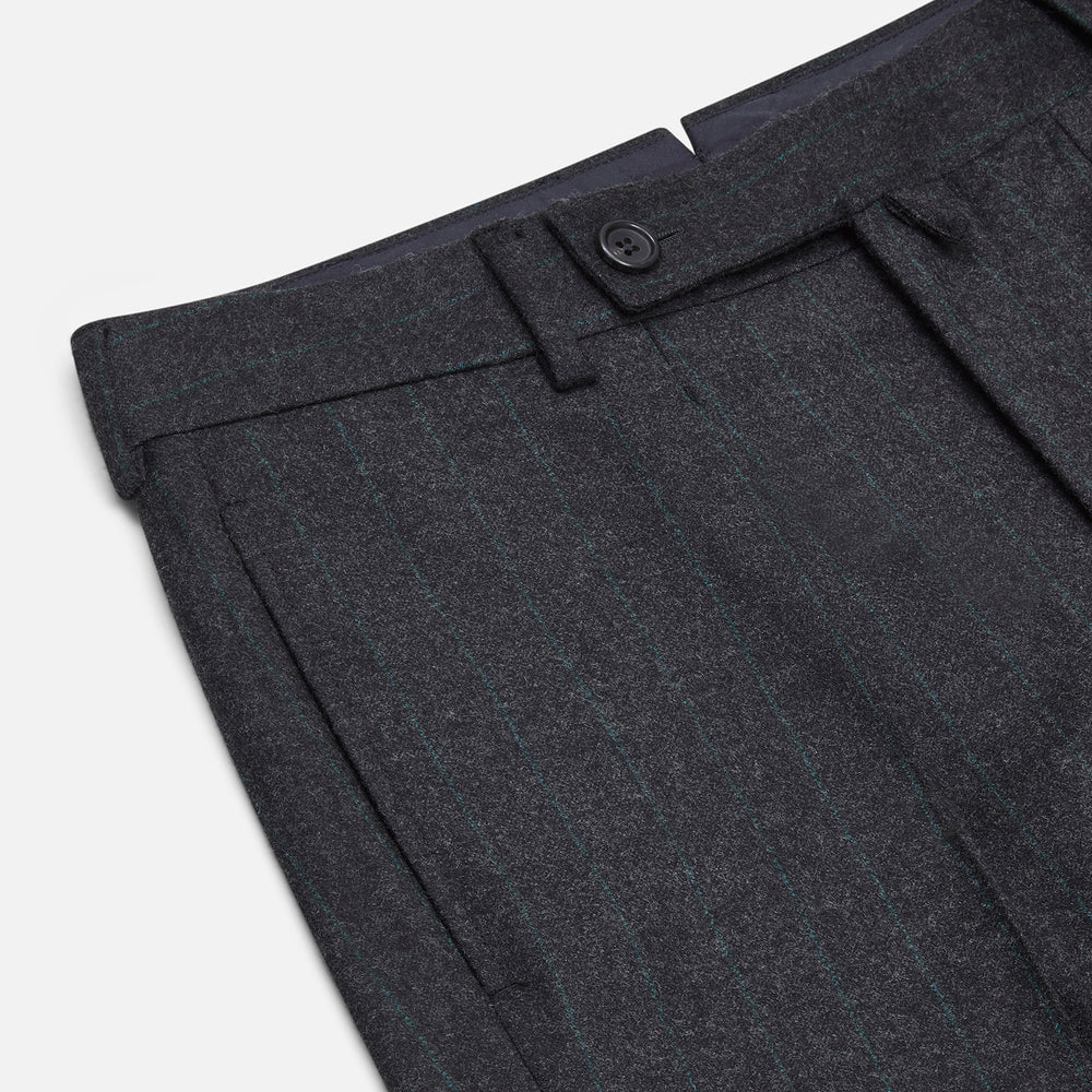 Turnbull & Asser’s Dark Grey Pinstripe Edward Trousers in a wool-cotton blend feature a subtle vertical stripe, front crease, straight cut, and classic waistband with belt loops, button, and zipper closure—perfect for semi-formal wear.