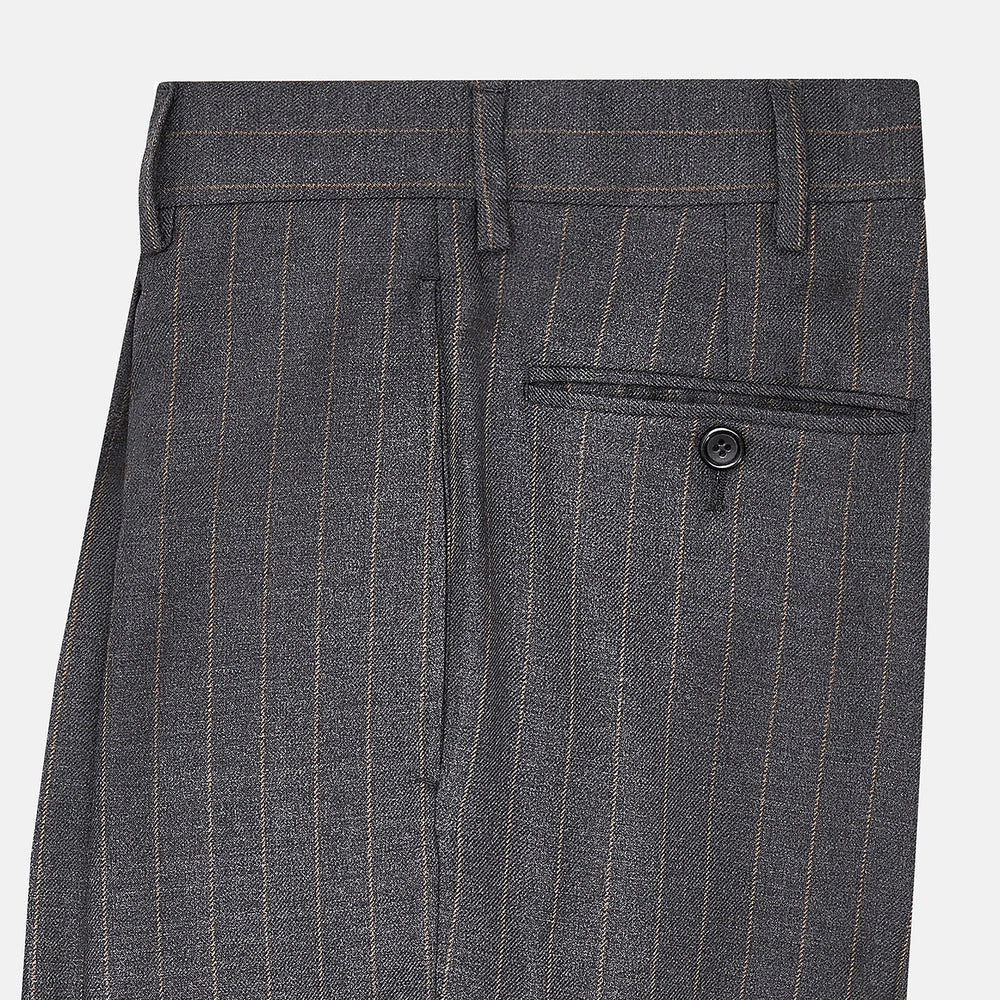 The Turnbull & Asser Dark Grey Pinstripe Arthur Trousers feature a subtle pinstripe, front button and zip closure, belt loops, and pleated front. These straight-leg trousers are shown against a plain white background.
