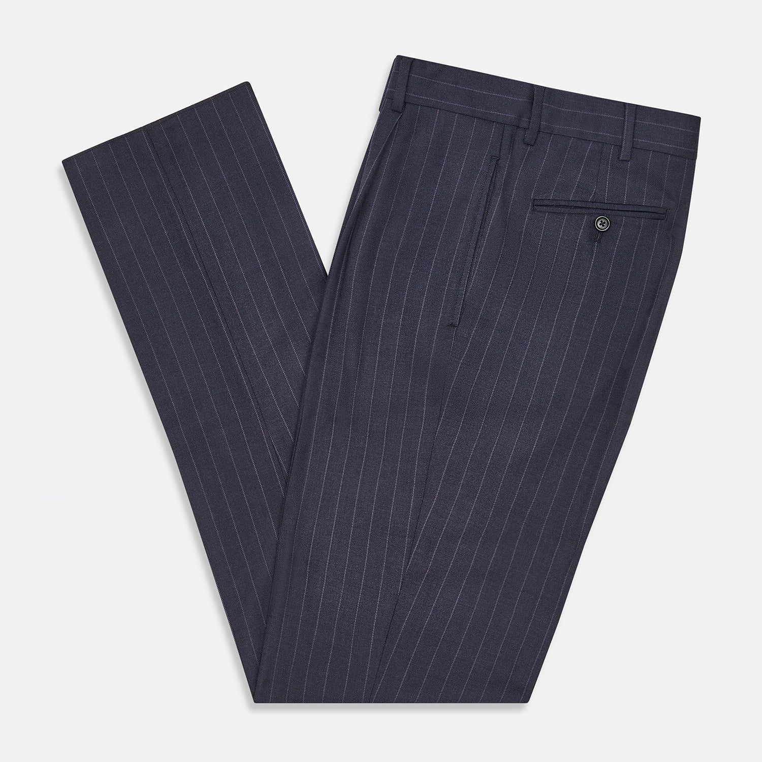 View 5 of product The Navy Pinstripe Arthur Trousers by Turnbull & Asser feature white vertical stripes, front pleats, a button closure, belt loops, and straight legs—adding modern menswear style to your wardrobe. Shown on a plain white background.
