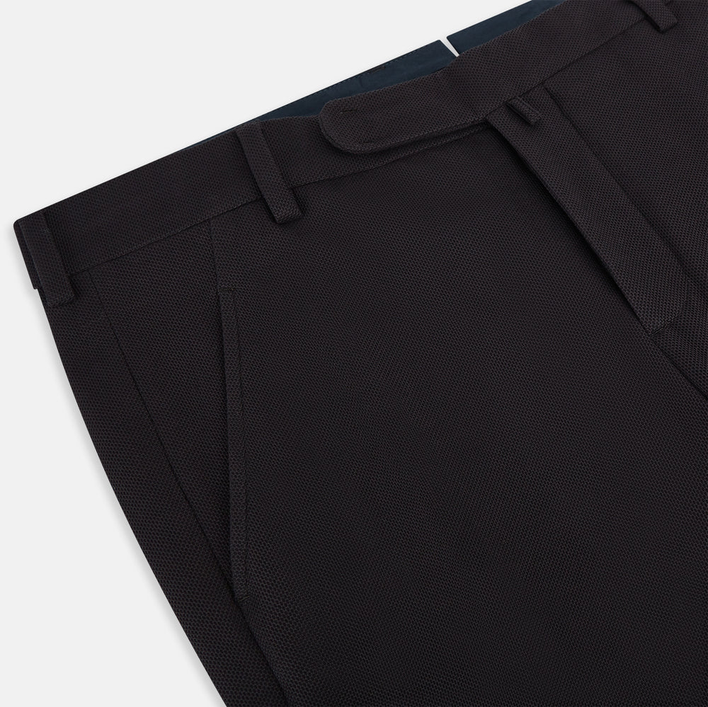 The Turnbull & Asser UK Dark Chocolate William Trousers are straight-leg dress pants with subtle pleats, belt loops, and a waistband, showcased against a plain white background.