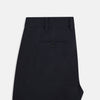 View 4 of product The Charcoal William Trousers by Turnbull & Asser UK feature a straight-leg cut, belt loops, and a flat front in classic dark navy blue, styled like traditional charcoal dress pants and shown on a plain white background.