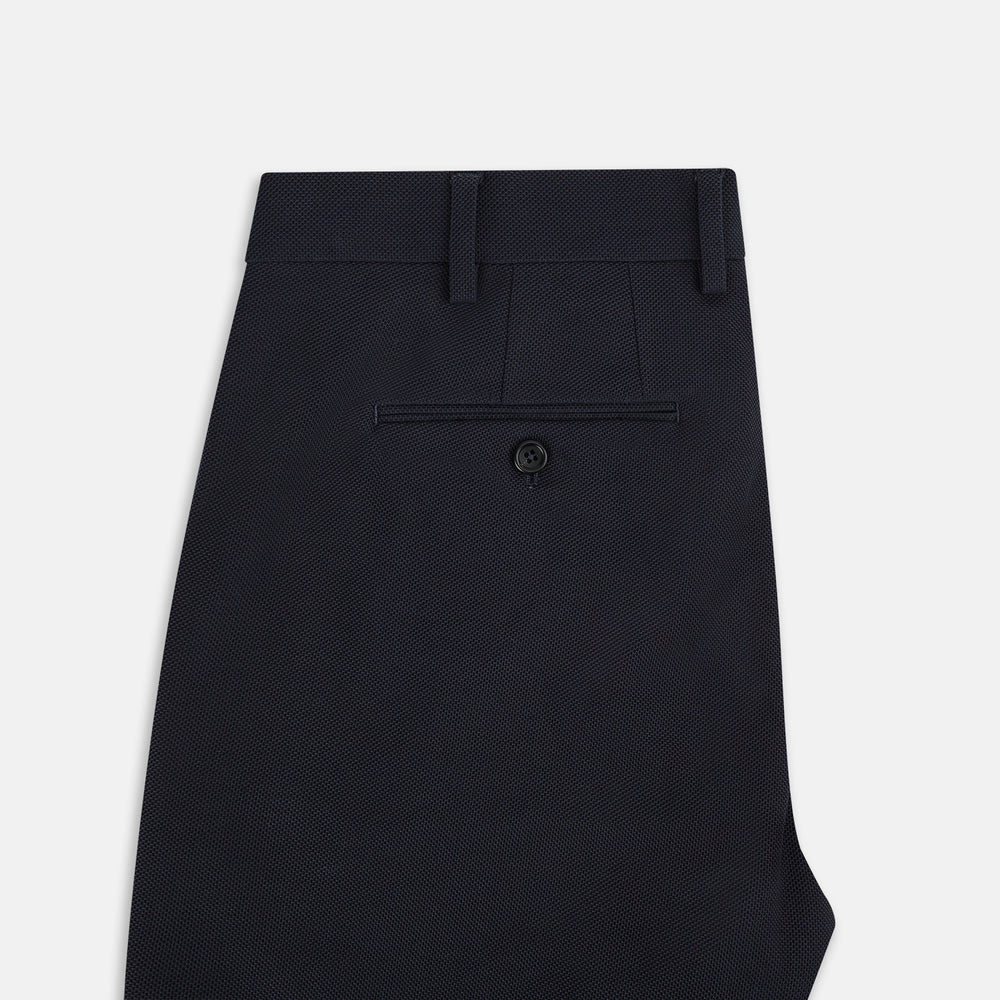 The Charcoal William Trousers by Turnbull & Asser UK feature a straight-leg cut, belt loops, and a flat front in classic dark navy blue, styled like traditional charcoal dress pants and shown on a plain white background.