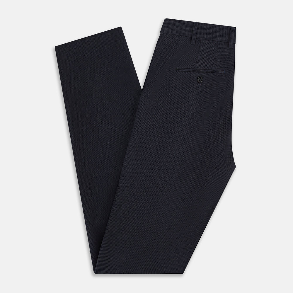 The Charcoal William Trousers by Turnbull & Asser UK feature a straight-leg cut, belt loops, and a flat front in classic dark navy blue, styled like traditional charcoal dress pants and shown on a plain white background.