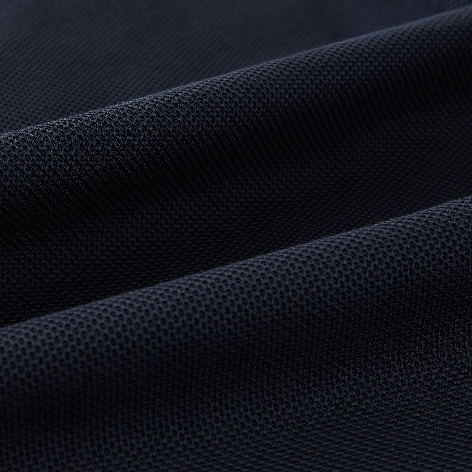 View 6 of product The Charcoal William Trousers by Turnbull & Asser UK feature a straight-leg cut, belt loops, and a flat front in classic dark navy blue, styled like traditional charcoal dress pants and shown on a plain white background.