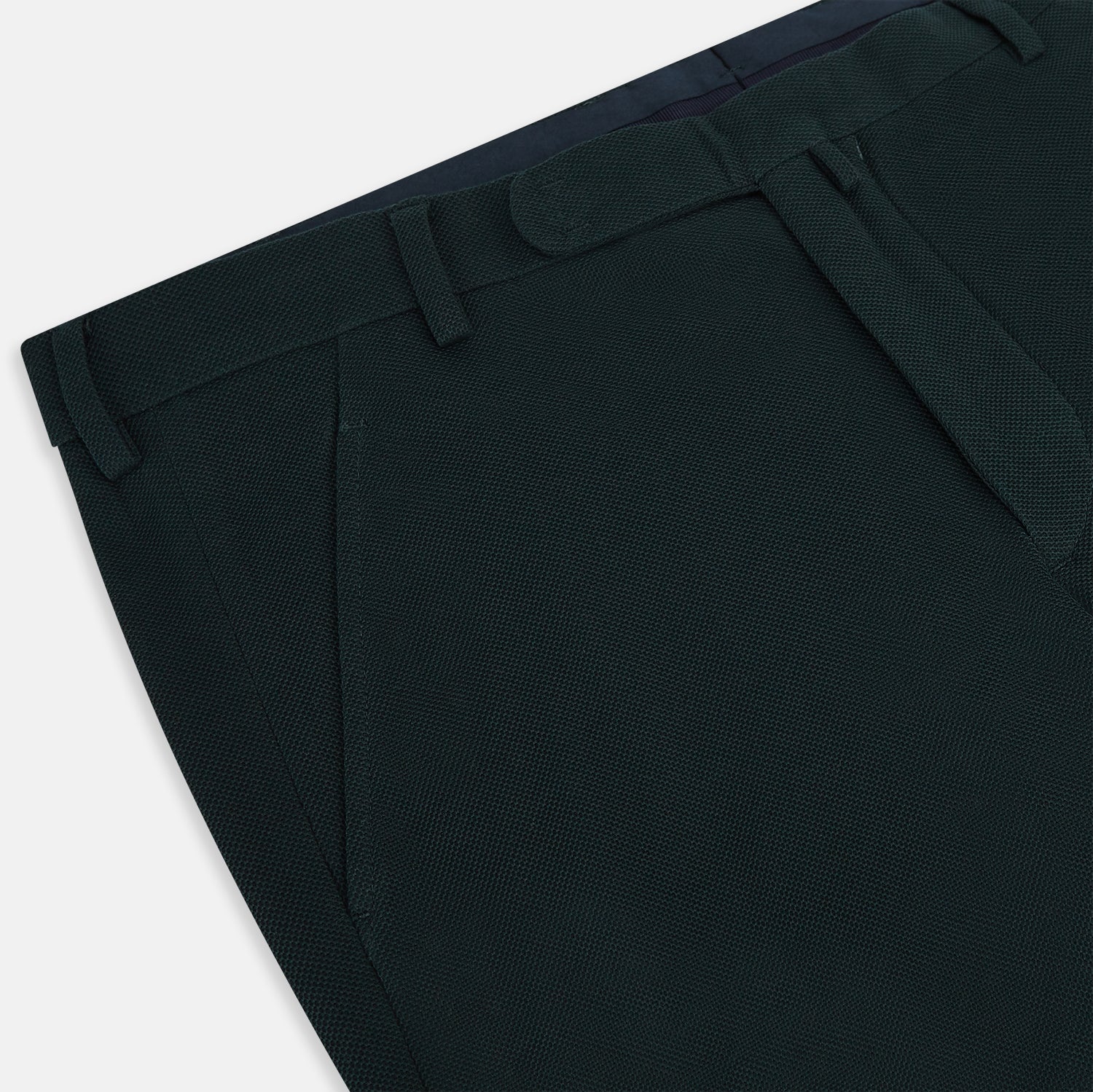 View 2 of product The Forest Green William Trousers by Turnbull & Asser UK are straight-leg, pleated trousers with belt loops and side pockets, displayed on a plain white background.