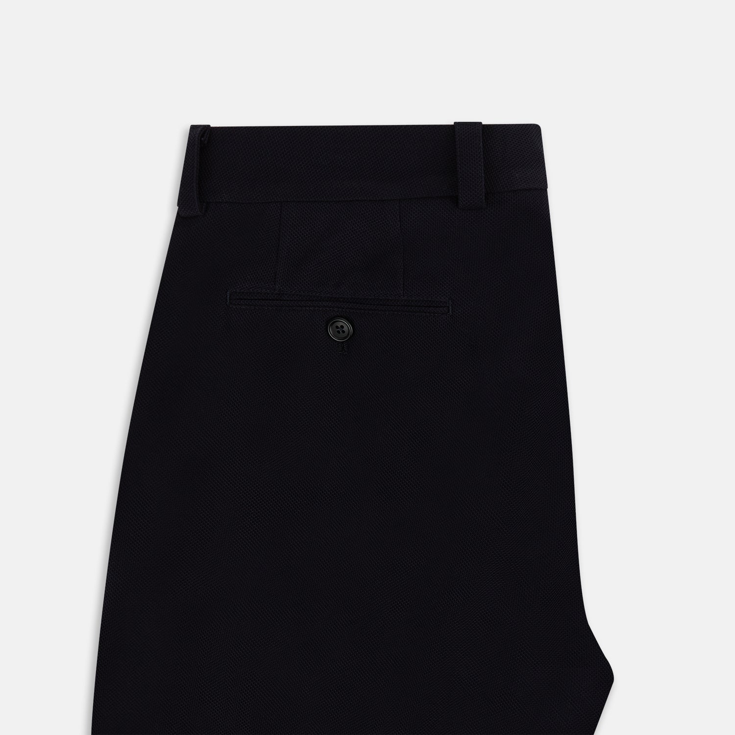 View 5 of product Turnbull & Asser Navy Knitted London Trousers feature a high waist, pleated tailoring, and a straight leg fit, displayed against a plain white background.