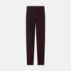 View 1 of product A pair of Burgundy Knitted London Trousers by Turnbull & Asser, featuring a tailored fit, button closure, front pleats, belt loops, and straight legs, displayed on a plain white background.