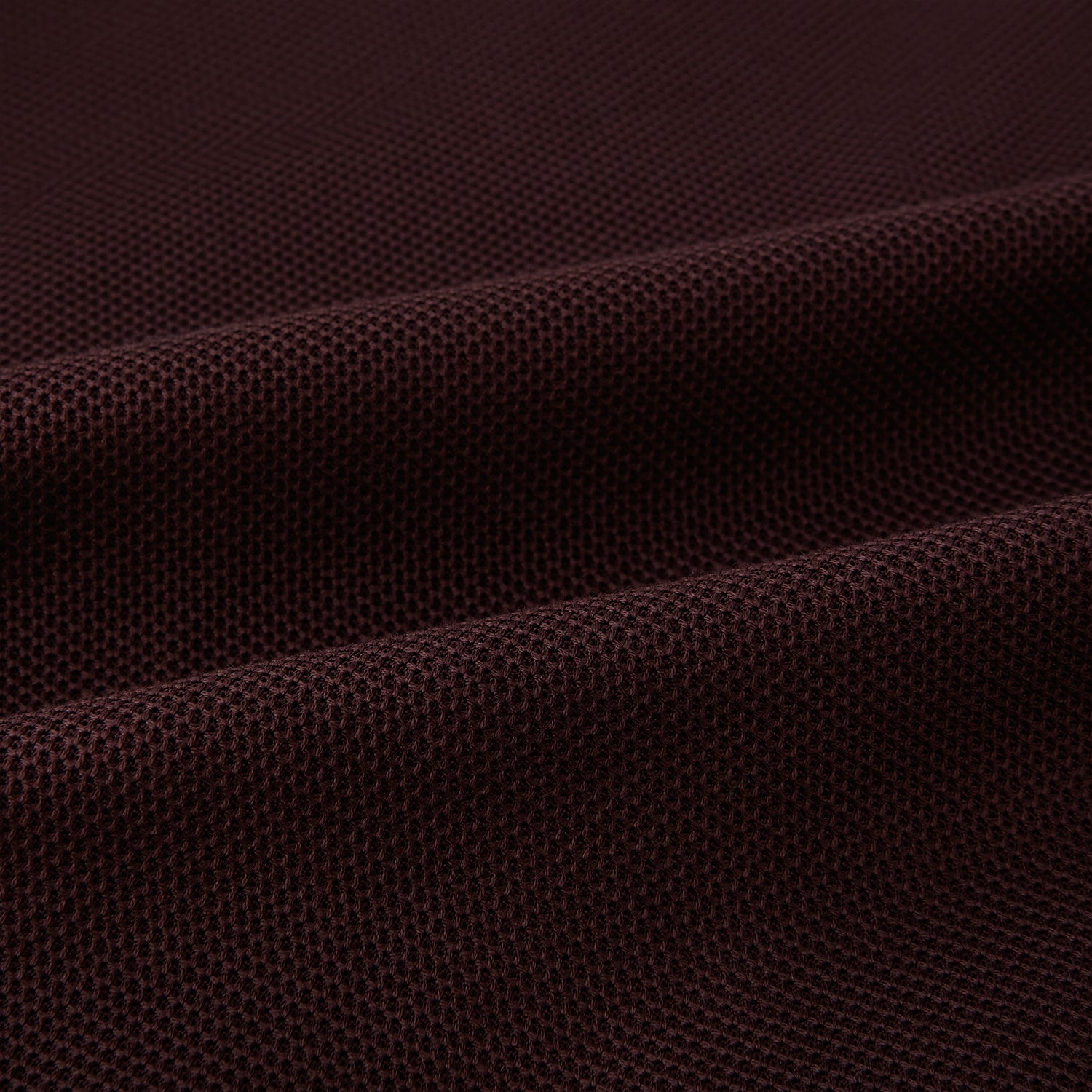 View 7 of product A pair of Burgundy Knitted London Trousers by Turnbull & Asser, featuring a tailored fit, button closure, front pleats, belt loops, and straight legs, displayed on a plain white background.