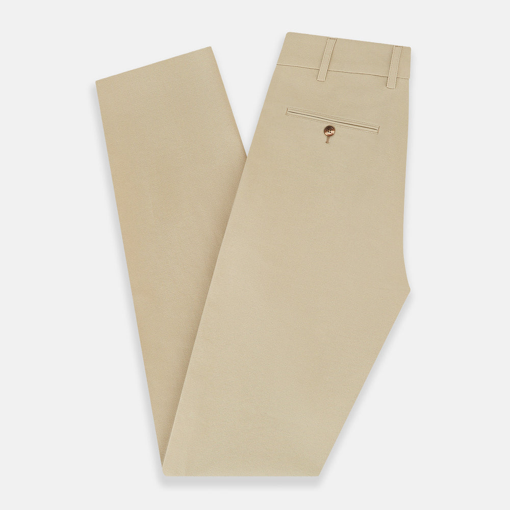 Amberley Sand Trousers in Cotton by Turnbull & Asser UK, featuring a straight-leg silhouette in beige cotton canvas with a button and zip closure, displayed against a plain white background.