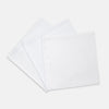 View 1 of product Three Turnbull & Asser Plain White Cotton Handkerchiefs from the 3-pack are neatly folded and overlapping on a light gray background.