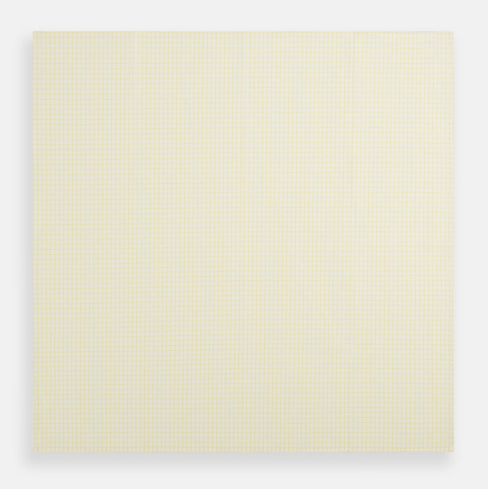 The Yellow Graph Check Handkerchief by Turnbull & Asser features a light yellow background with evenly spaced, thin yellow grid lines forming small squares—evoking the look of classic graph paper.
