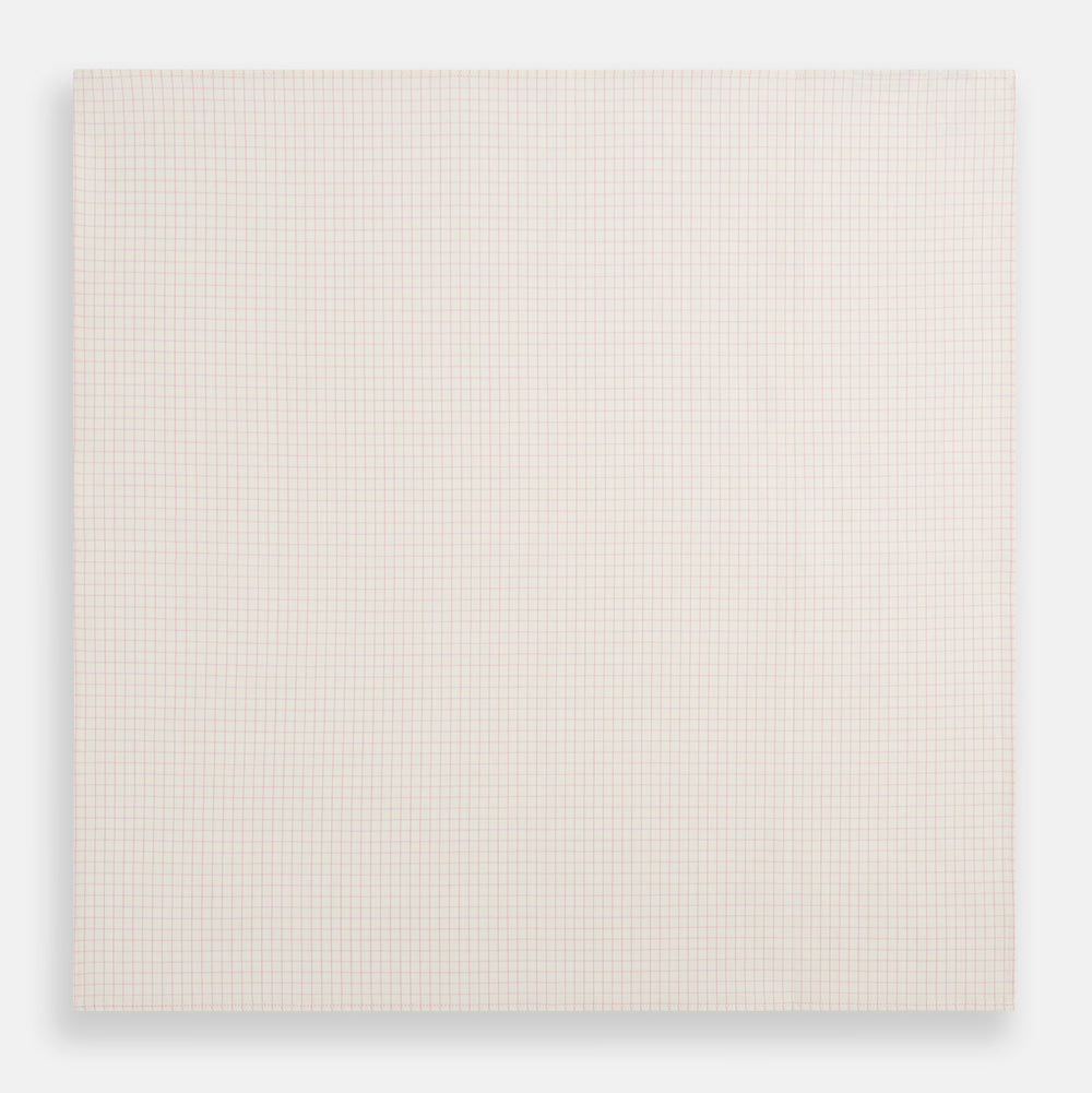 The Turnbull & Asser Pink Graph Check Handkerchief features a subtle red checkered grid on pink cotton, making it a refined formal accessory, as elegantly shown against a white background.