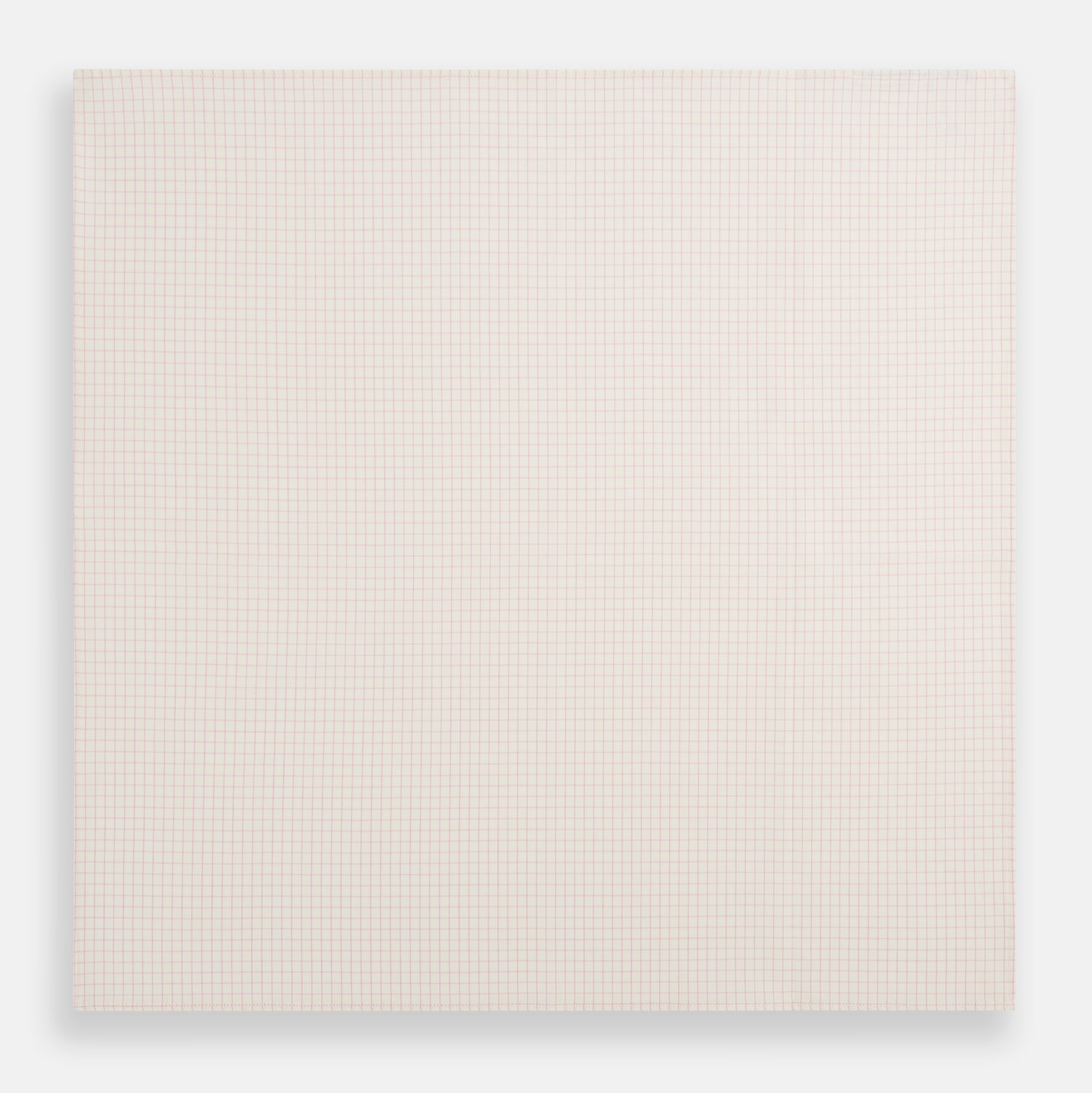 View 3 of product The Turnbull & Asser Pink Graph Check Handkerchief features a subtle red checkered grid on pink cotton, making it a refined formal accessory, as elegantly shown against a white background.