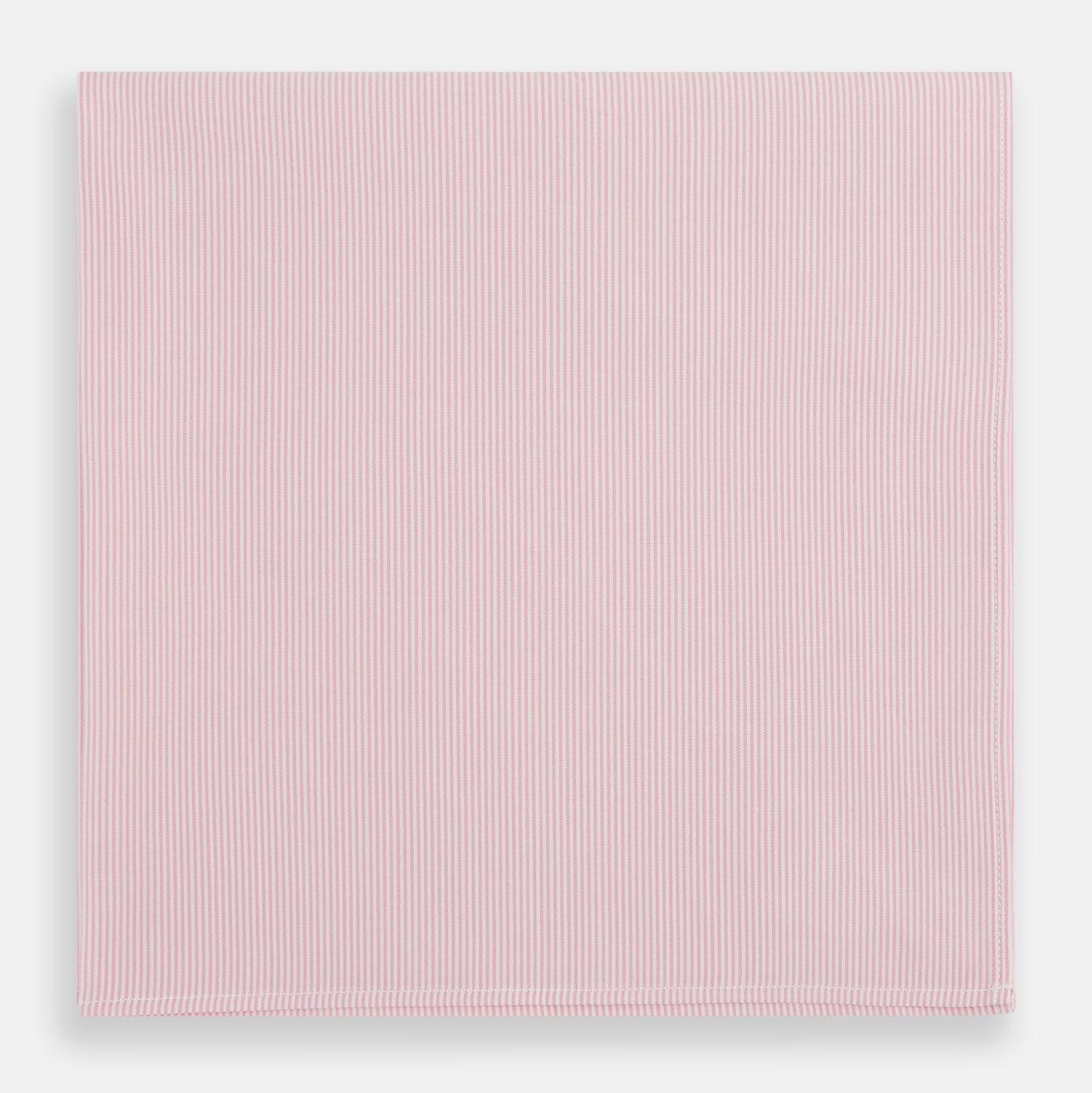 View 1 of product The Turnbull & Asser Pink Pencil Stripe Handkerchief, crafted from soft cotton, is neatly folded and displayed on a white background—a sophisticated formal accessory for any occasion.