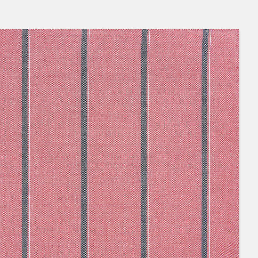 The Turnbull & Asser UK Coral Pink Track Stripe Hand-Rolled Handkerchief is a square accessory featuring evenly spaced dark gray and white vertical stripes on a coral pink background. Expertly crafted in England, it boasts elegant hand-rolled edges and is displayed against a plain white background.
