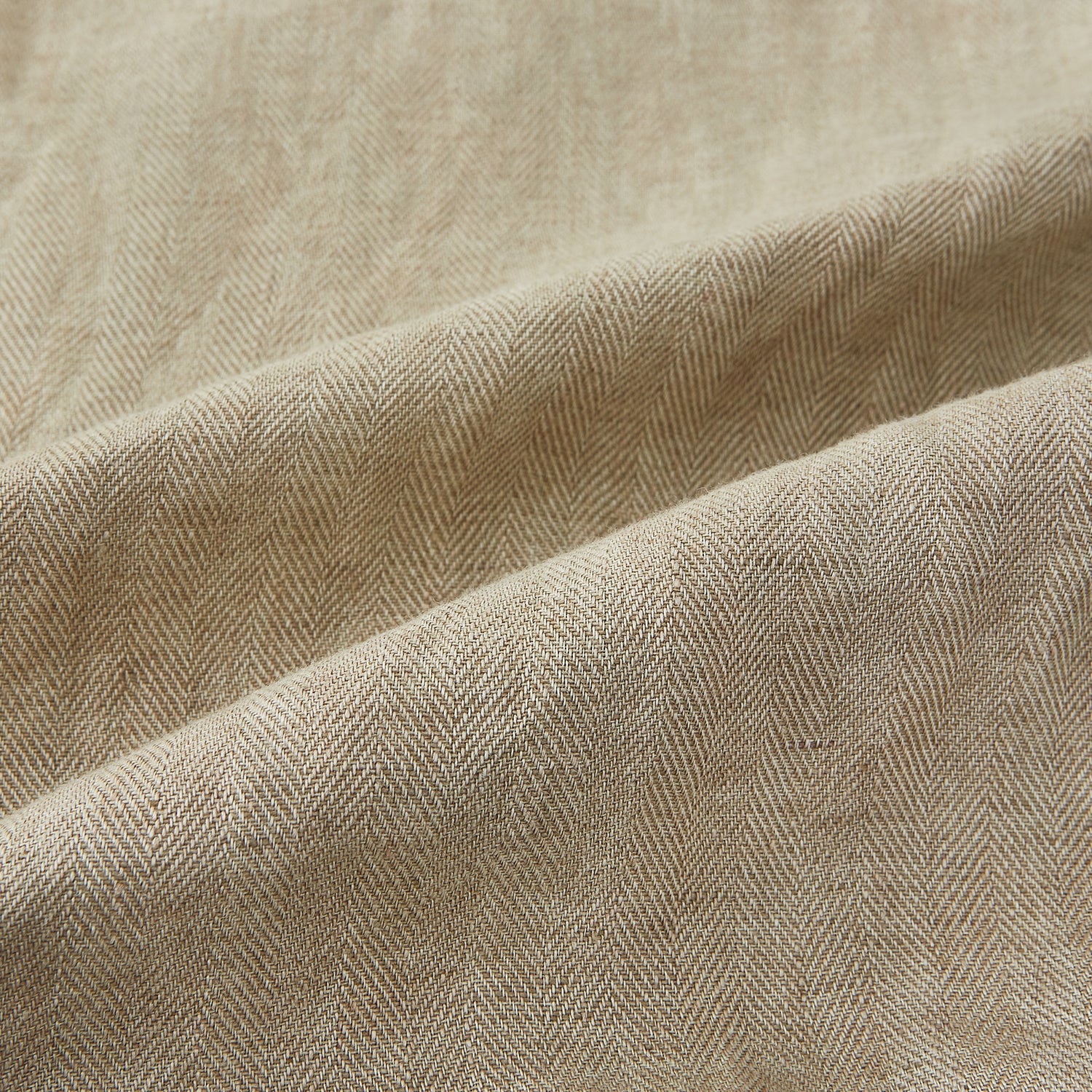 View 5 of product A Fairway Sand Golf Jacket in Linen by Turnbull & Asser UK, crafted from lightweight herringbone linen, features a front zipper, a chest zip pocket, two side zip pockets, and dark navy cuffs, collar lining, and waistband. Shown on a plain white background.
