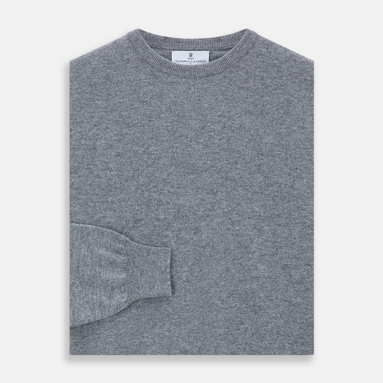 View 3 of product The Turnbull & Asser Flannel Grey Crew Neck Cashmere Jumper is shown flat on a white background.