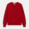 View 1 of product The Turnbull & Asser Deep Red Crew Neck Cashmere Jumper features long sleeves and a plain, solid hue—luxuriously soft and ideal for smart casual style. Displayed flat on a white background.