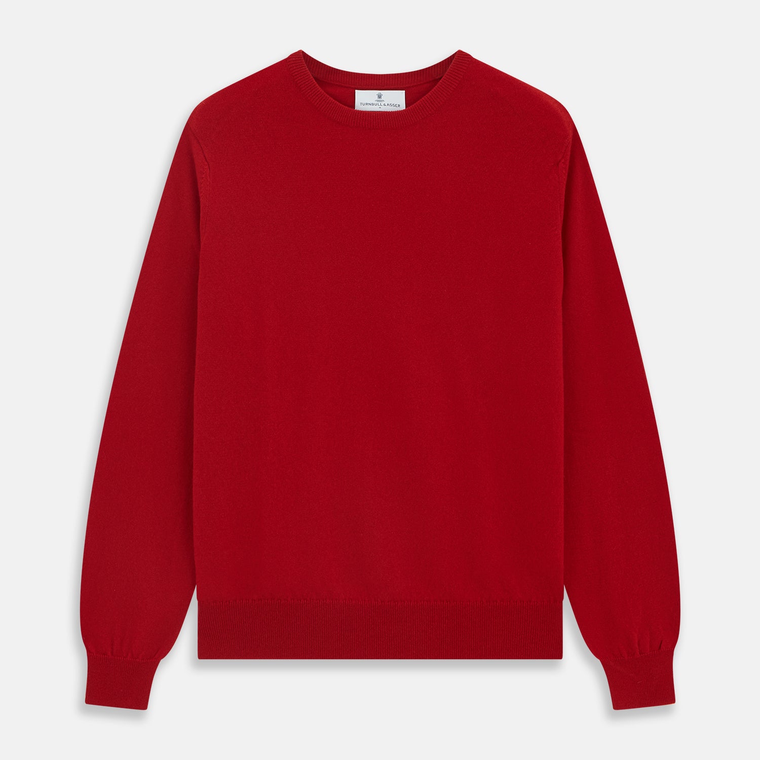 View 1 of product The Turnbull & Asser Deep Red Crew Neck Cashmere Jumper features long sleeves and a plain, solid hue—luxuriously soft and ideal for smart casual style. Displayed flat on a white background.