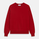 The Turnbull & Asser Deep Red Crew Neck Cashmere Jumper features long sleeves and a plain, solid hue—luxuriously soft and ideal for smart casual style. Displayed flat on a white background.