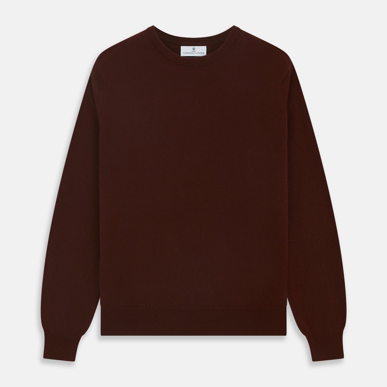 View 1 of product The Turnbull & Asser Port Cashmere Crew Neck Jumper, in dark brown, features a plain design with long sleeves and is shown laid flat on a white background.