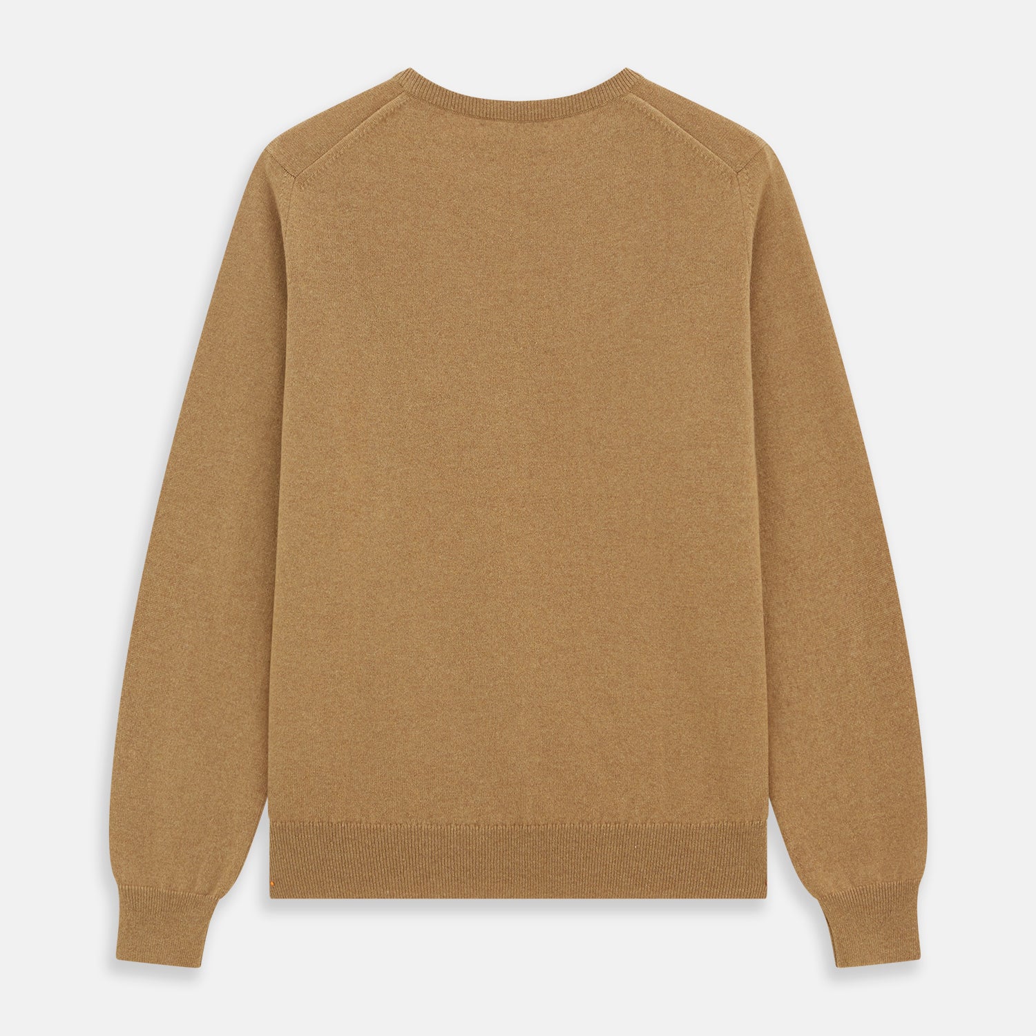 View 4 of product The Turnbull & Asser Camel Crew Neck Merino Wool Jumper is a classic, long-sleeve sweater in camel, laid flat on a white background. Featuring ribbed collar, cuffs, and hem, it’s an essential staple for every gentleman’s wardrobe.