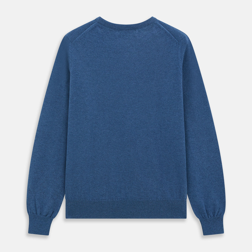 The Turnbull & Asser Blue Crew Neck Cashmere Jumper is laid flat on a white background, showcasing ribbed cuffs, hem, and neckline for an elegant, smart-casual style.