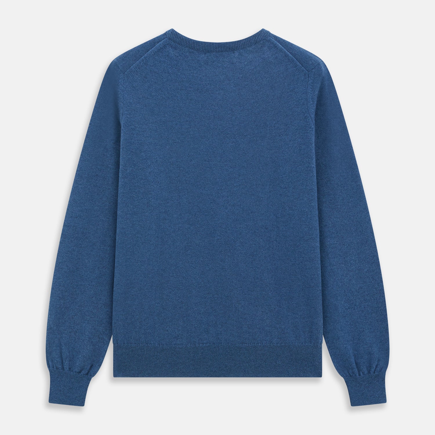 View 4 of product The Turnbull & Asser Blue Crew Neck Cashmere Jumper is laid flat on a white background, showcasing ribbed cuffs, hem, and neckline for an elegant, smart-casual style.
