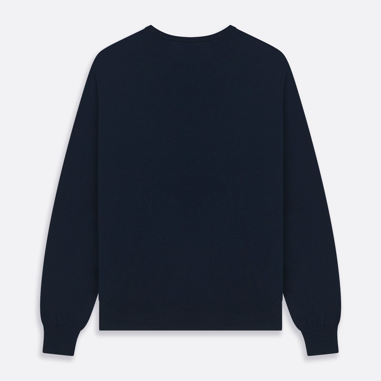 View 4 of product The Turnbull & Asser Navy V-Neck Cashmere Jumper, featuring long sleeves and ribbed cuffs and hem, is laid flat on a white background, showcasing its simple and classic design.