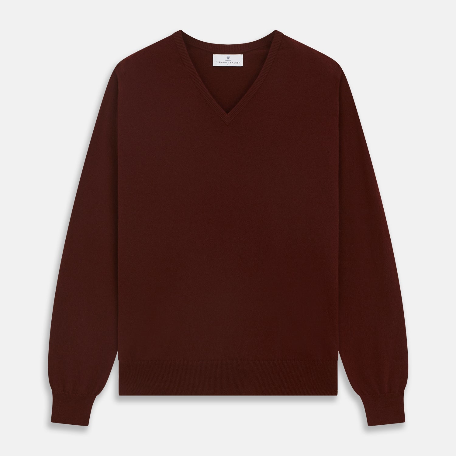 View 1 of product The Turnbull & Asser Port Cashmere V-Neck Jumper is a plain, long-sleeved burgundy sweater with a V-neck, shown flat on a white background.