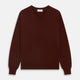 The Turnbull & Asser Port Cashmere V-Neck Jumper is a plain, long-sleeved burgundy sweater with a V-neck, shown flat on a white background.