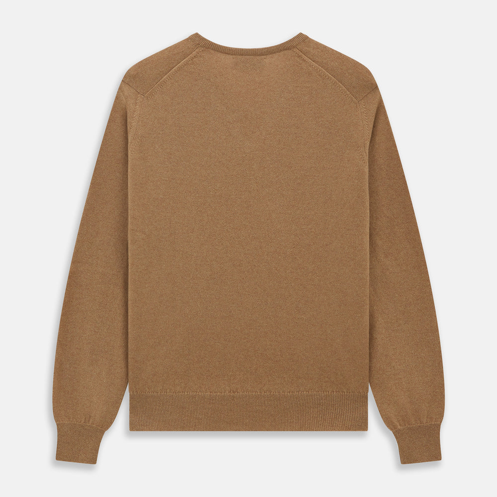 The Turnbull & Asser Natural V-Neck Cashmere Jumper, in camel, features long sleeves and ribbed cuffs, hem, and neckline. Crafted from Scottish cashmere, it’s laid flat on a white background for a refined smart casual look.
