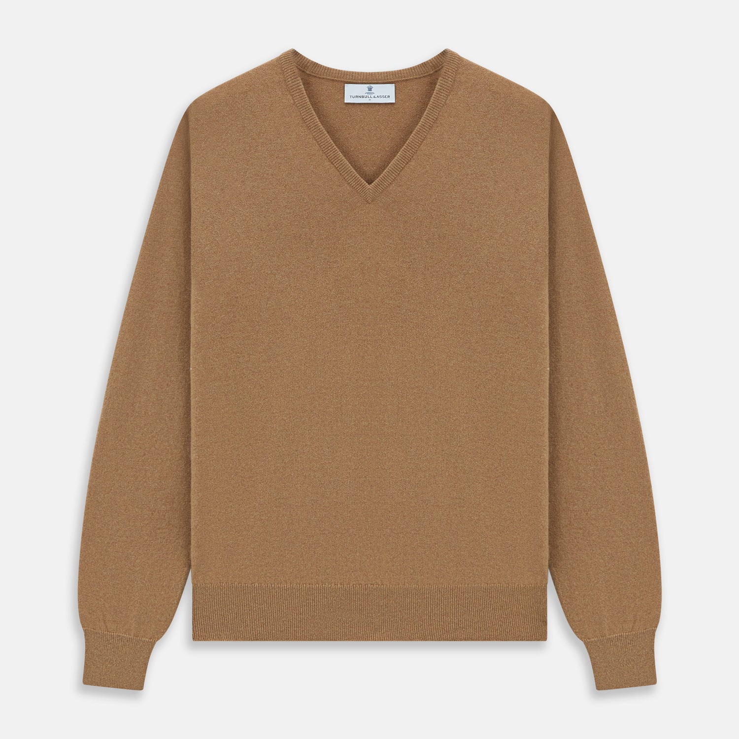 View 1 of product The Turnbull & Asser Natural V-Neck Cashmere Jumper, in camel, features long sleeves and ribbed cuffs, hem, and neckline. Crafted from Scottish cashmere, it’s laid flat on a white background for a refined smart casual look.