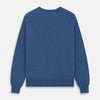View 4 of product The Turnbull & Asser Blue V-Neck Cashmere Jumper, crafted from soft Scottish cashmere with ribbed cuffs, hem, and neckline, is shown laid flat on a white background for a refined smart-casual appeal.