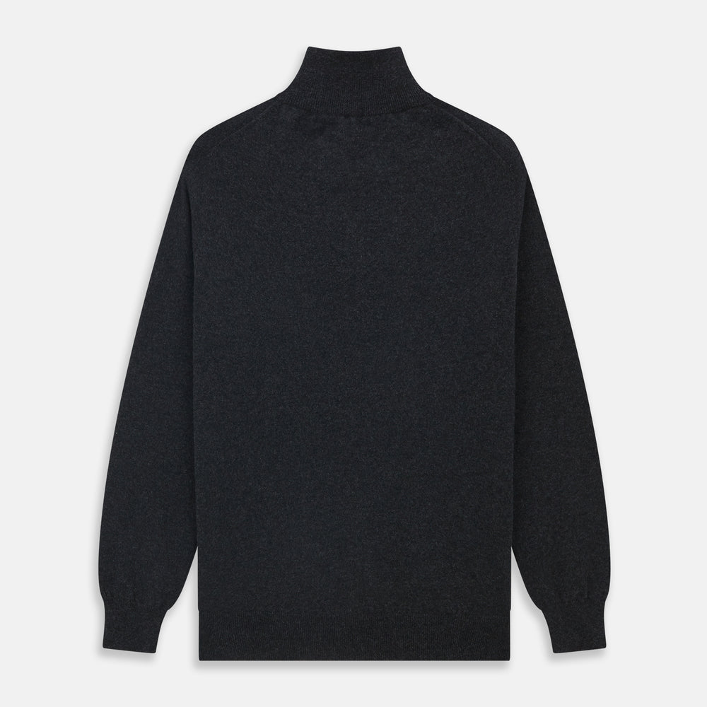 The Turnbull & Asser Charcoal Half-Zip Cashmere Jumper features long sleeves, a high collar, and a zip closure from the collar down the chest. Displayed flat with sleeves extended, it is crafted in dark charcoal grey cashmere.