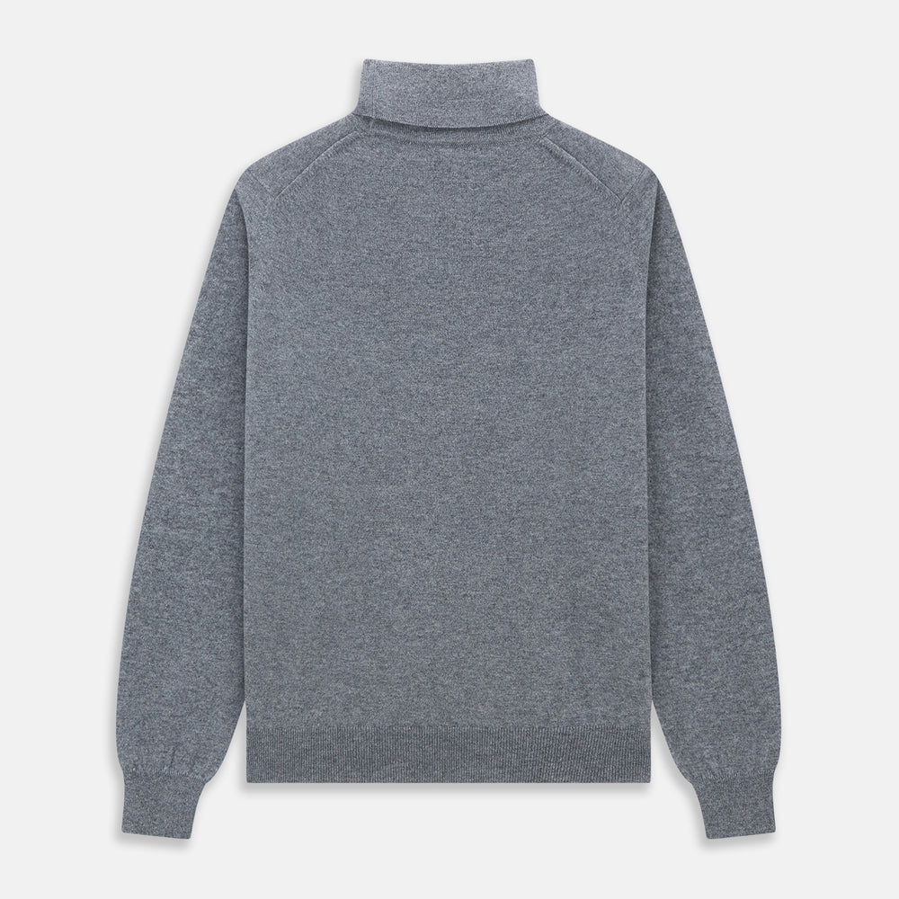 The Turnbull & Asser Kylian Flannel Grey Roll Neck Jumper features long sleeves, ribbed cuffs and hem—ideal for autumn layering. Laid flat on a white background.