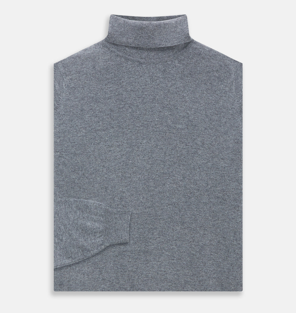 The Turnbull & Asser Kylian Flannel Grey Roll Neck Jumper features long sleeves, ribbed cuffs and hem—ideal for autumn layering. Laid flat on a white background.