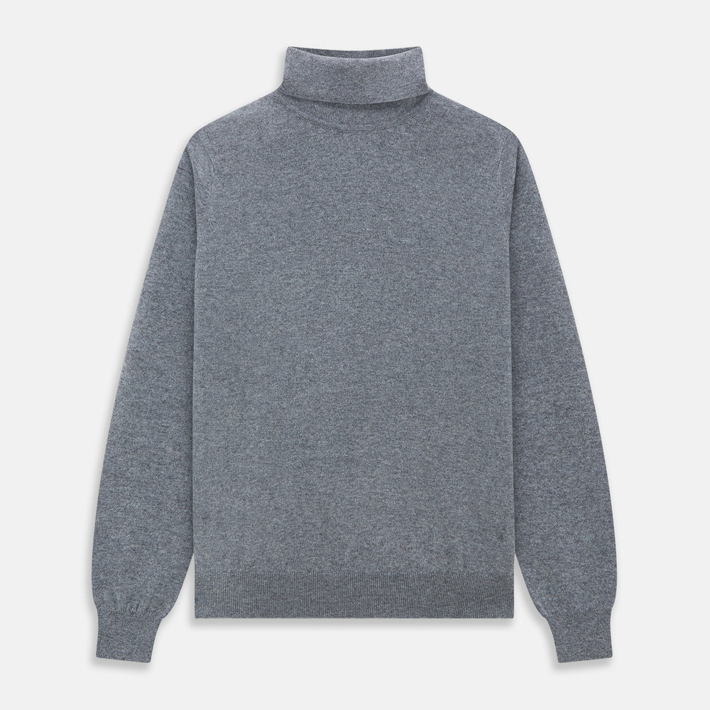 The Turnbull & Asser Kylian Flannel Grey Roll Neck Jumper features long sleeves, ribbed cuffs and hem—ideal for autumn layering. Laid flat on a white background.
